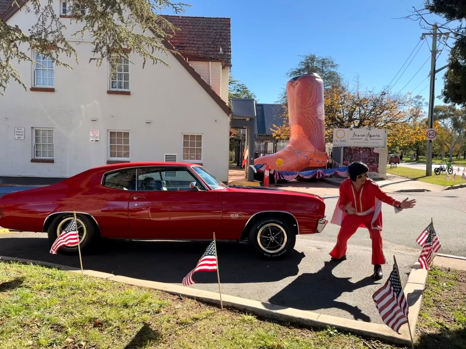 Cherry-red Chevelle parked outside Mercure Canberra for Fourth of July celebrations